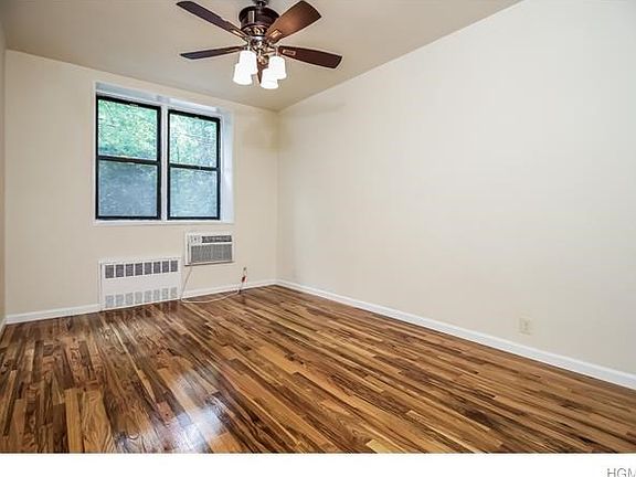 Here is our spacious air conditioned master bedroom with ceiling fan.