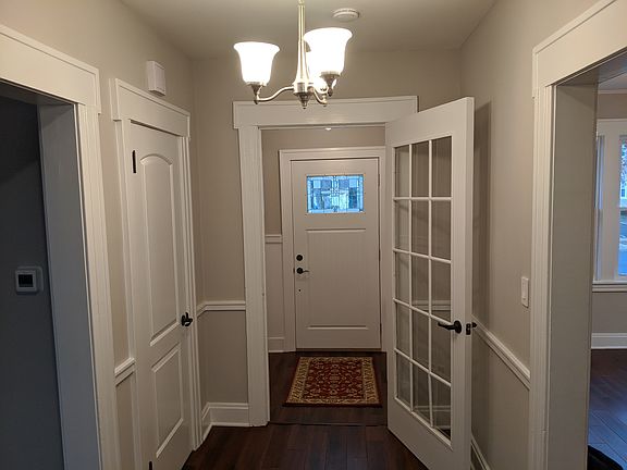 Foyer with a coat closet