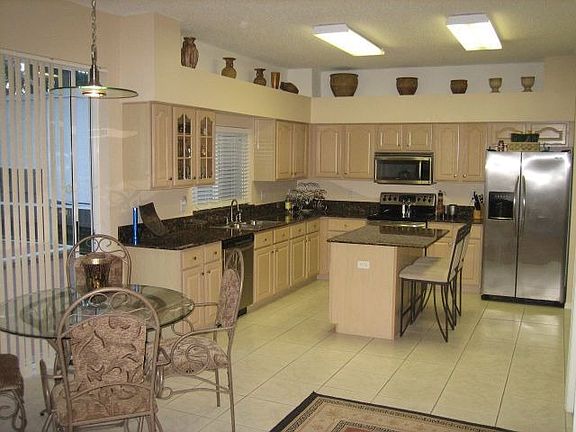 Kitchen with granite/stainless appliances