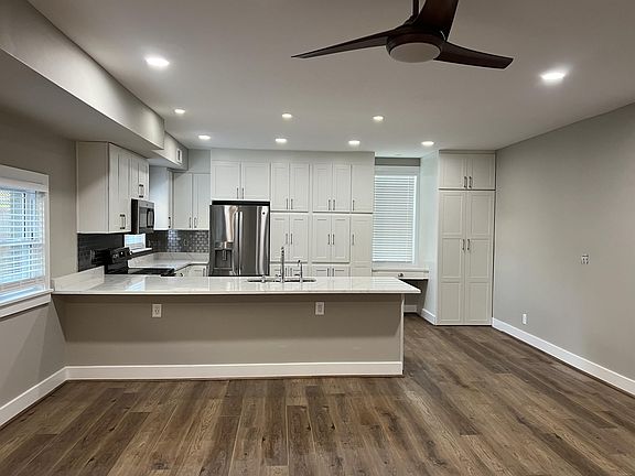 Living room and kitchen from entry door