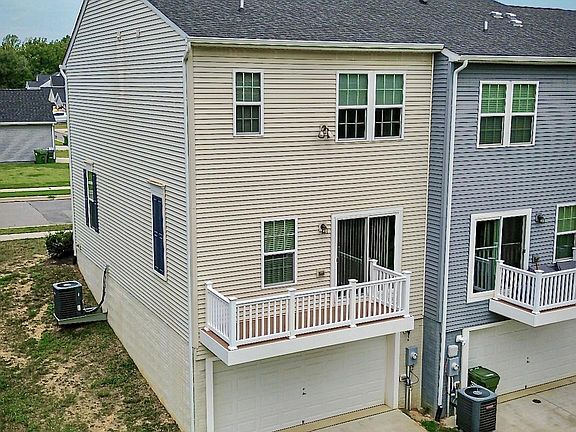 3-Level End Unit Townhome w/ 2-Car Garage