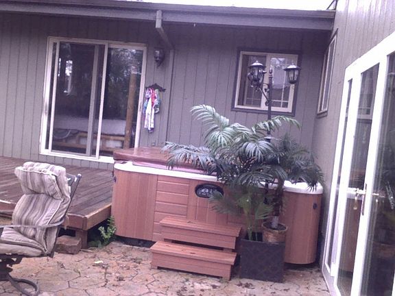hot tub and deck of master