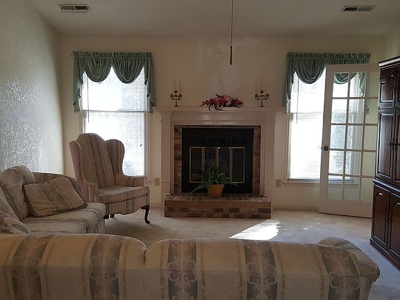 Open living room w/fireplace