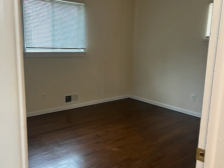 Master bedroom, window facing backyard