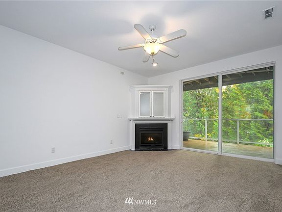 Great Room with Fireplace & Slider to Deck