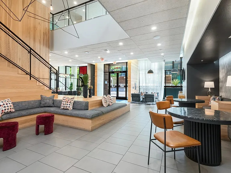Resident Lounge Featuring Plush Benches and Bold FinResident Lounge Featuring Plush Benches and Bold Finishes