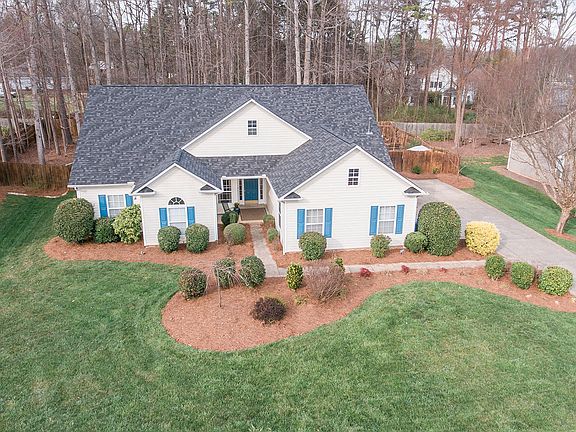 Large, wooded lot awaits.