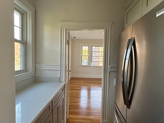 Kitchen area with work area and storage