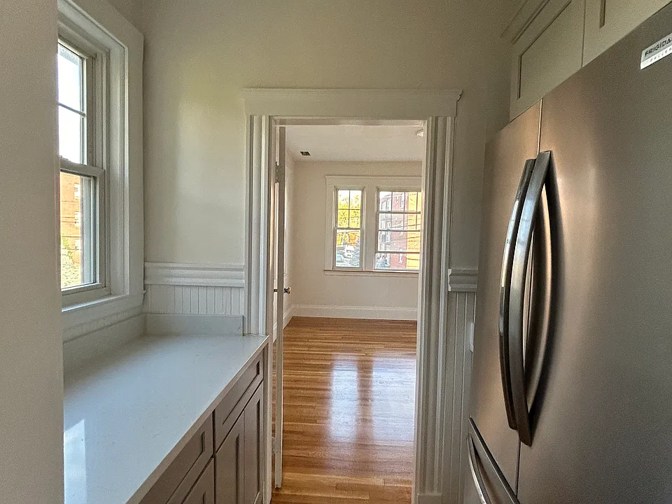 Kitchen area with work area and storage