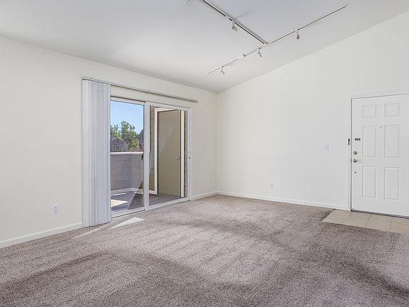 Freshly painted walls and modern light fixtures on ceiling