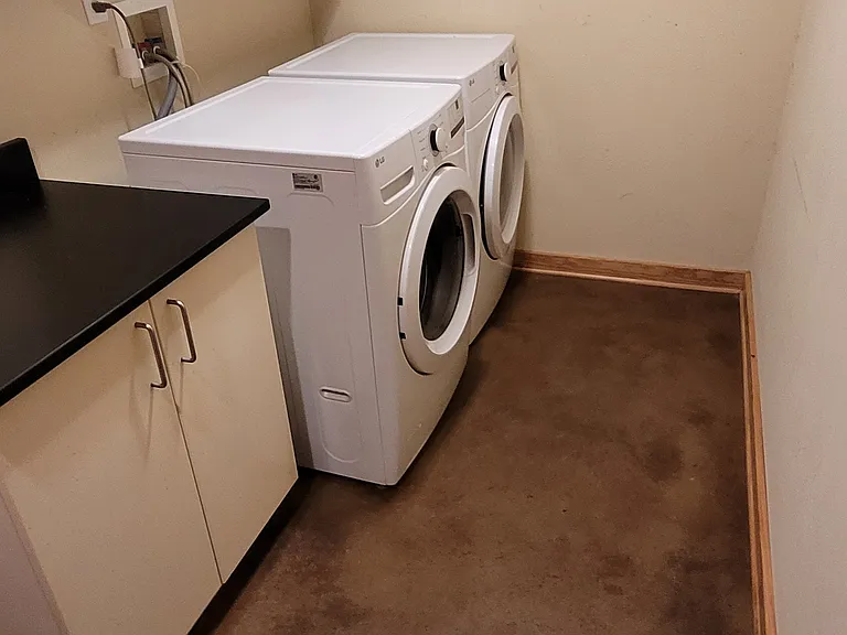 Laundry Room with new (2023) LG washer & dryer. 
Laundry Room doubles as a mudroom with large coat closet (not pictured).
