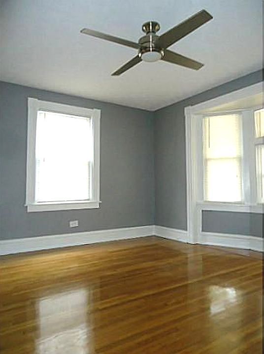 Living room features hardwood floors and plenty of natural light