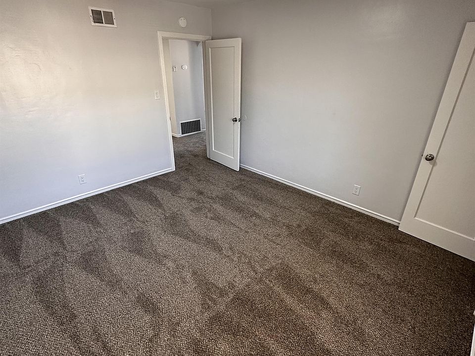 Bedroom #1 features updated power and light switches for enhanced functionality.