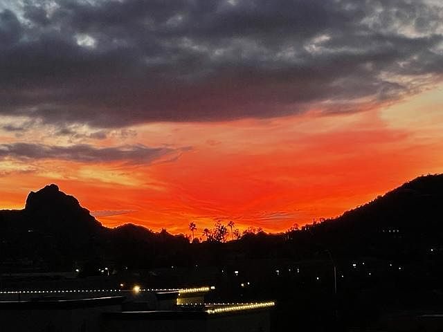 Sunset view from Balcony- Camelback on left and Mummy Mountain on right