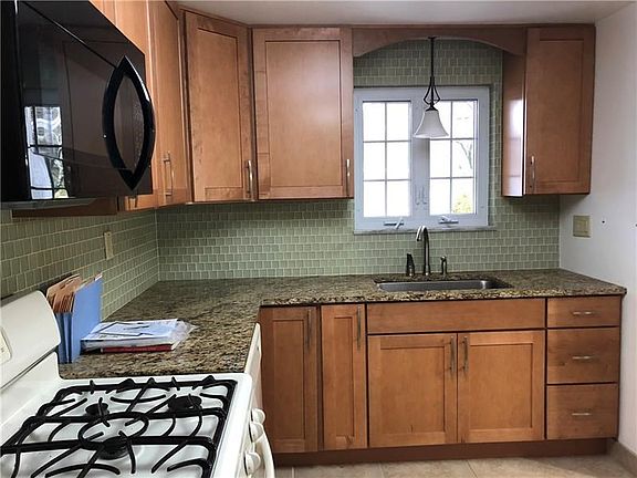 Kitchen - newly remodeled, granite countertops, pantry.