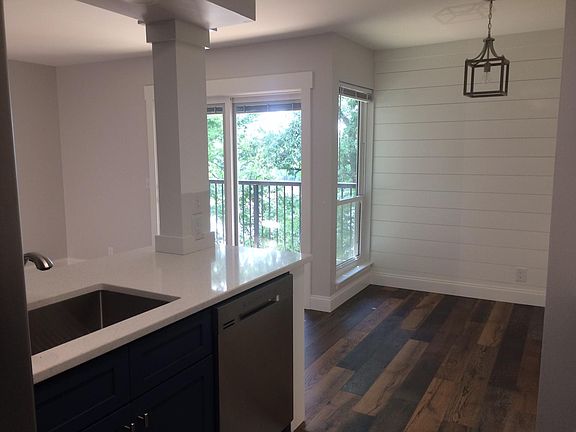 Looking toward the river front deck from the kitchen
