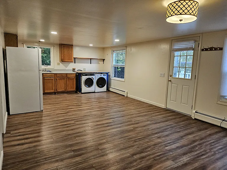 Kitchen opens up to the living room yet still has plenty of room for a dinner table.