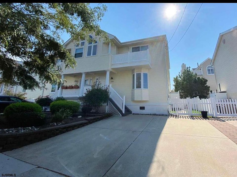 Front of home includes driveway for 2 cars.