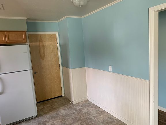 Door leads to attached garage. This is off the kitchen