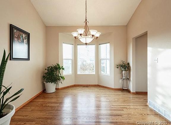 Gleaming wood floors for dining room