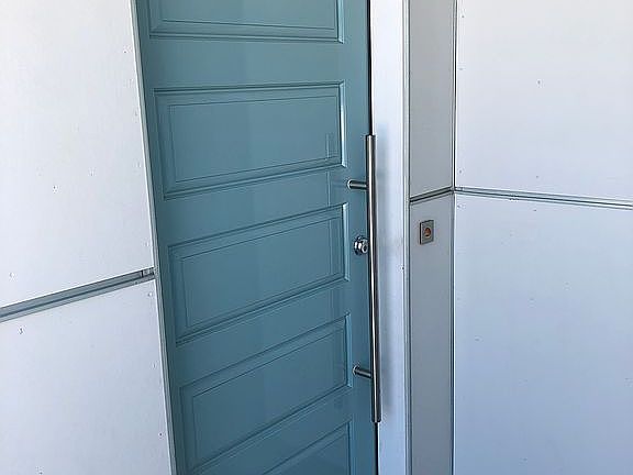 Protected front entrance. 