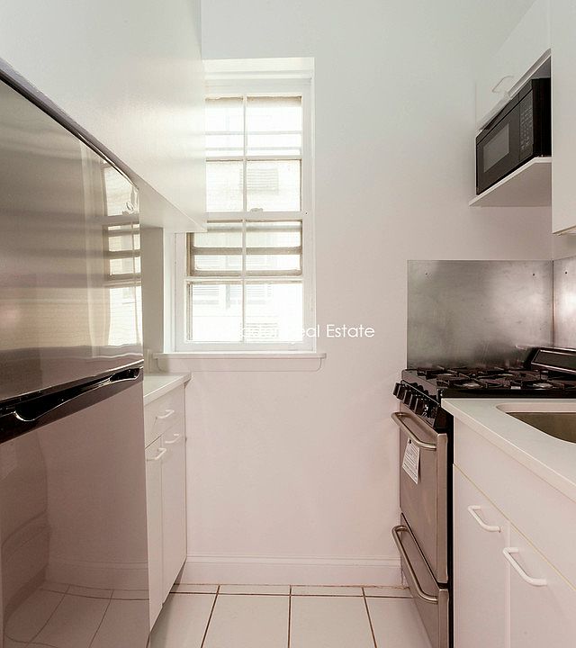 1st image of 112 E 11th St APT 1B