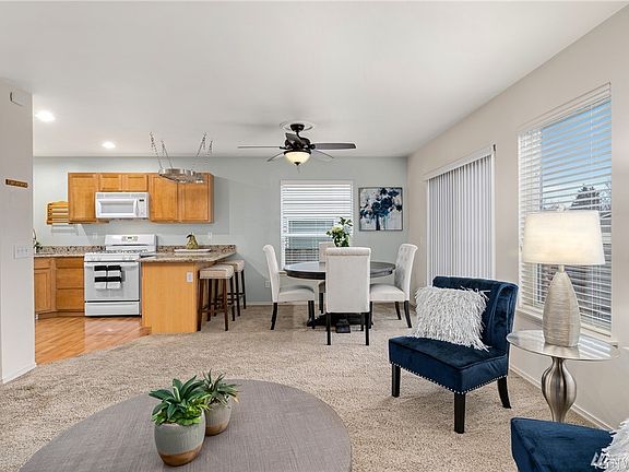 Multiple programmable remote controlled ceiling fans.