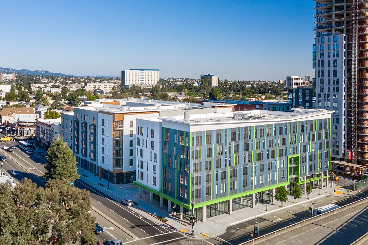 A bold architectural statement in the heart of the city_where design meets convenience. - MacArthur Commons