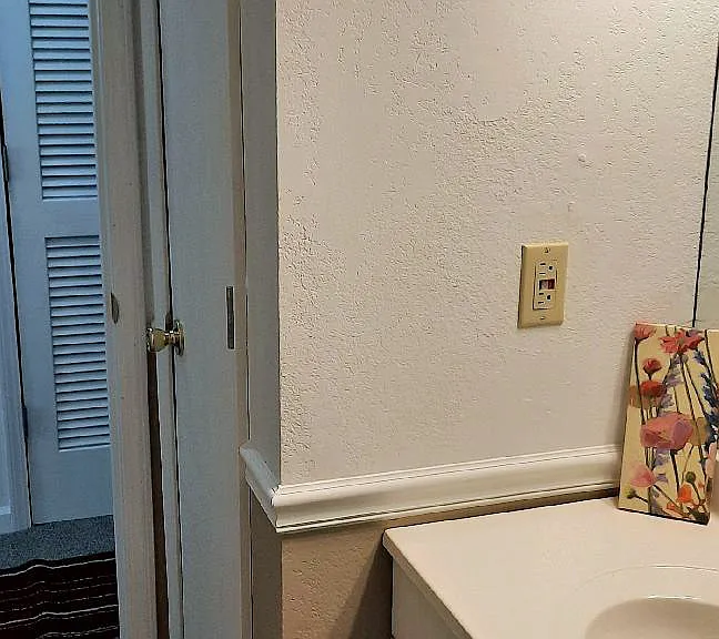 ...the bathroom also has a closet with adjustable shelves for towels, toiletries, extra storage...
