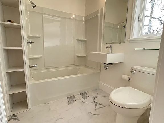 bath has access from bedroom and living area; floorplan and all room measurements on our website