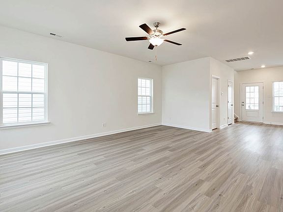 Vinyl flooring can be found throughout the living area