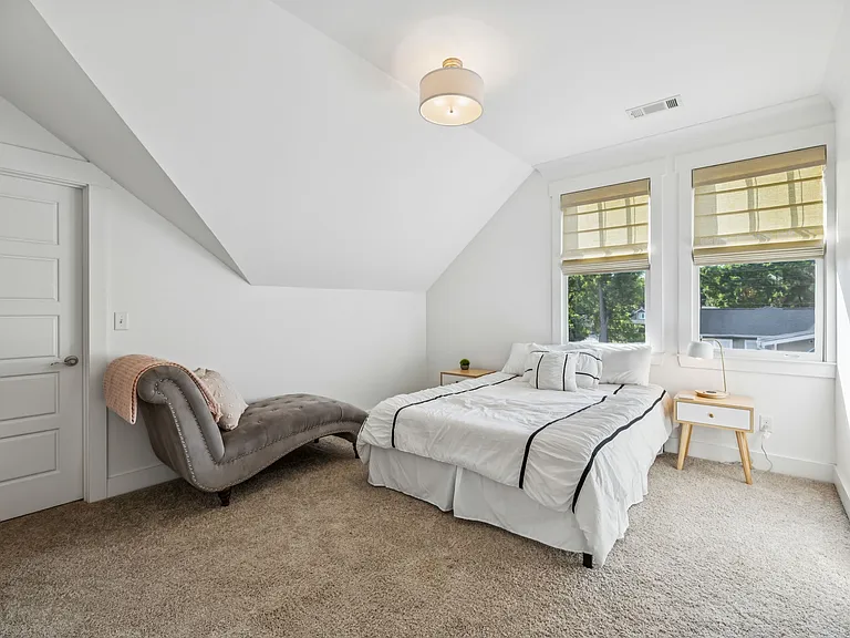 Bedroom 3, featuring a queen bed.