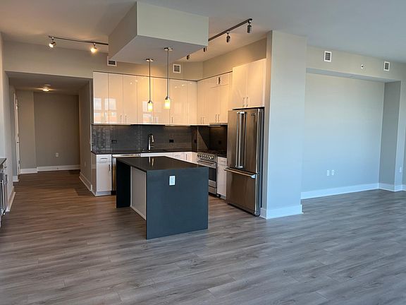 Kitchen and entryway, view from dining area