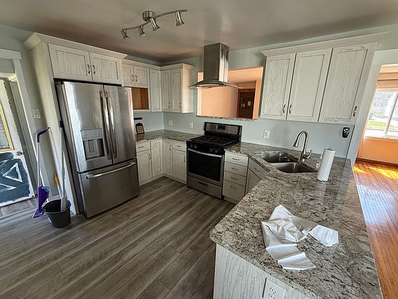 Kitchen with gas stove & dishwasher
