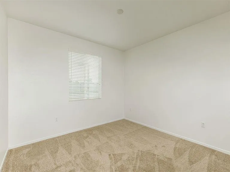 2nd bedroom with a lot of space with window