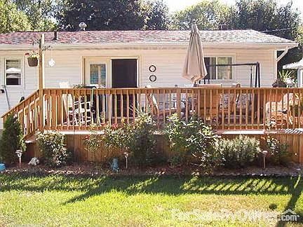 New Deck
						:
						Deck facing the back yard, facing a wooded area across the alley.