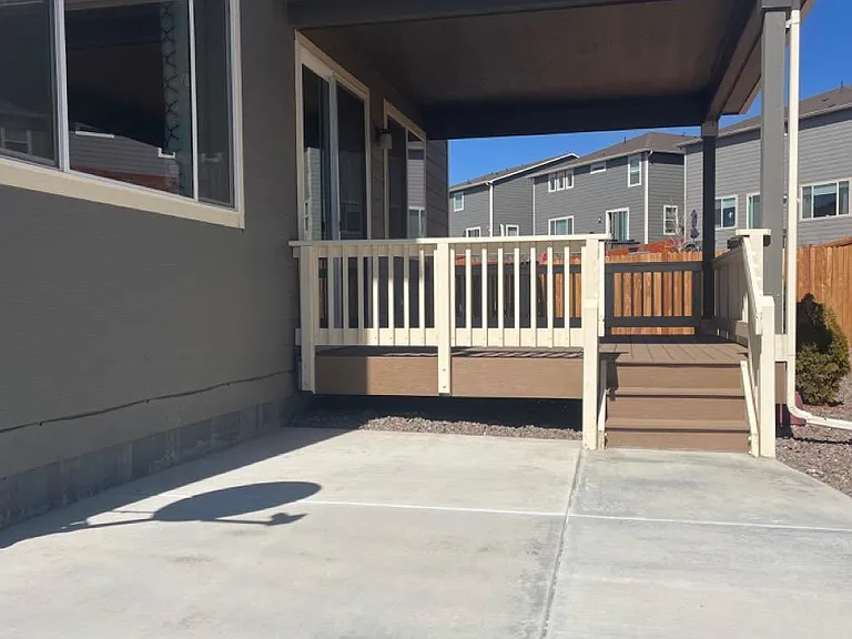 Concrete patio by the deck (uncovered)