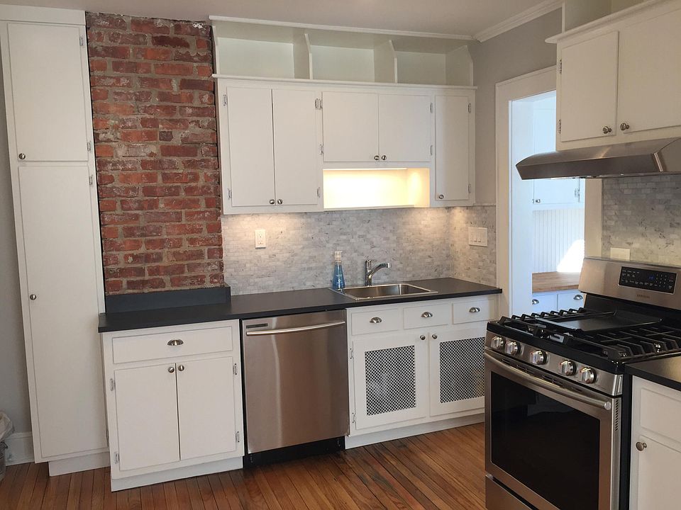 Newly renovated kitchen with new gas range, new dishwasher, 