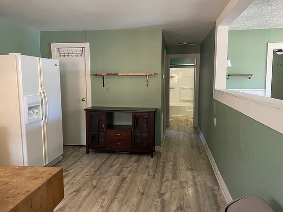 from kitchen down the hall into the bathroom and bedroom #2 on the left.