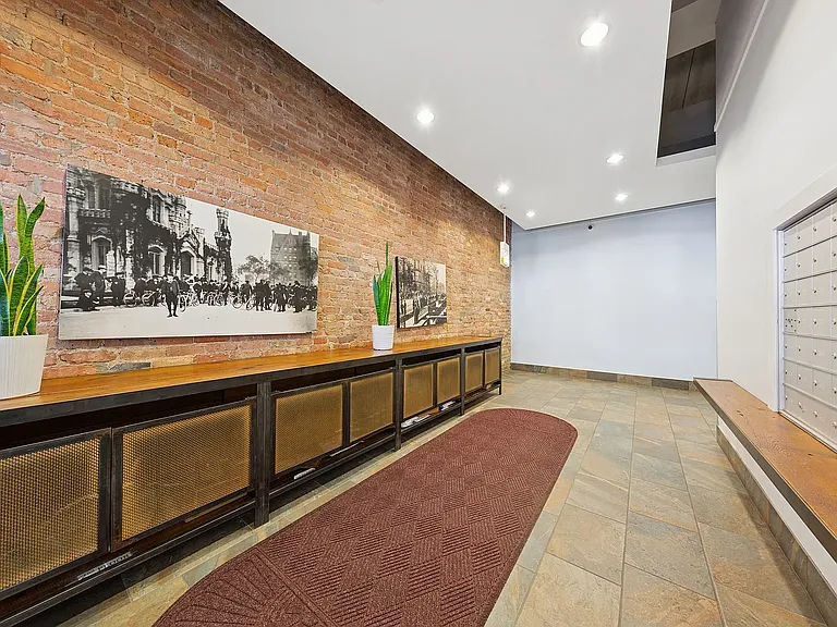 Shared element: walk-in foyer with package cabinets and keyed mail slots