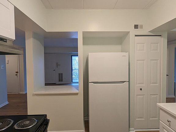 Kitchen, with serving window into living rooom