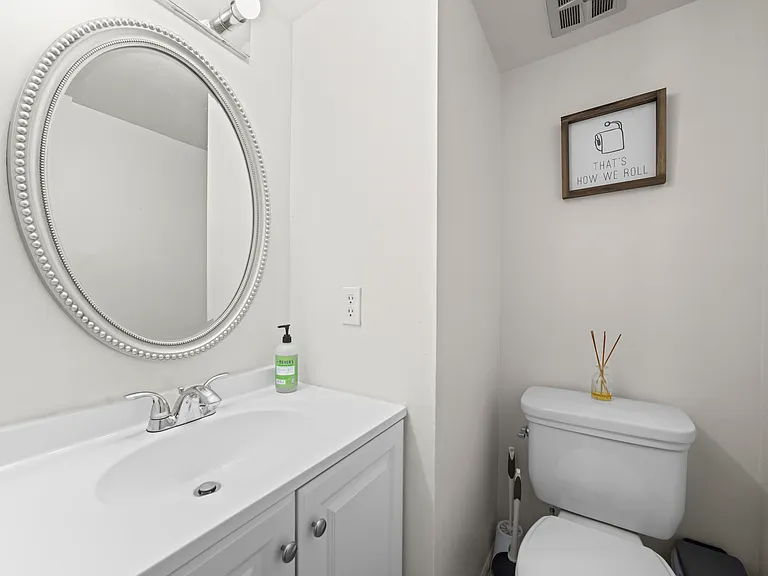 Convenient main-floor half bathroom, perfect for guests and everyday use.