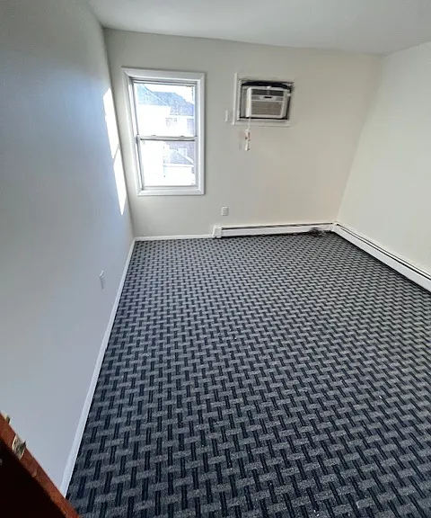 SPACIOUS BEDROOM WITH WALL MOUNTED AC