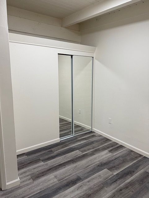 Bedroom with mirrored closet