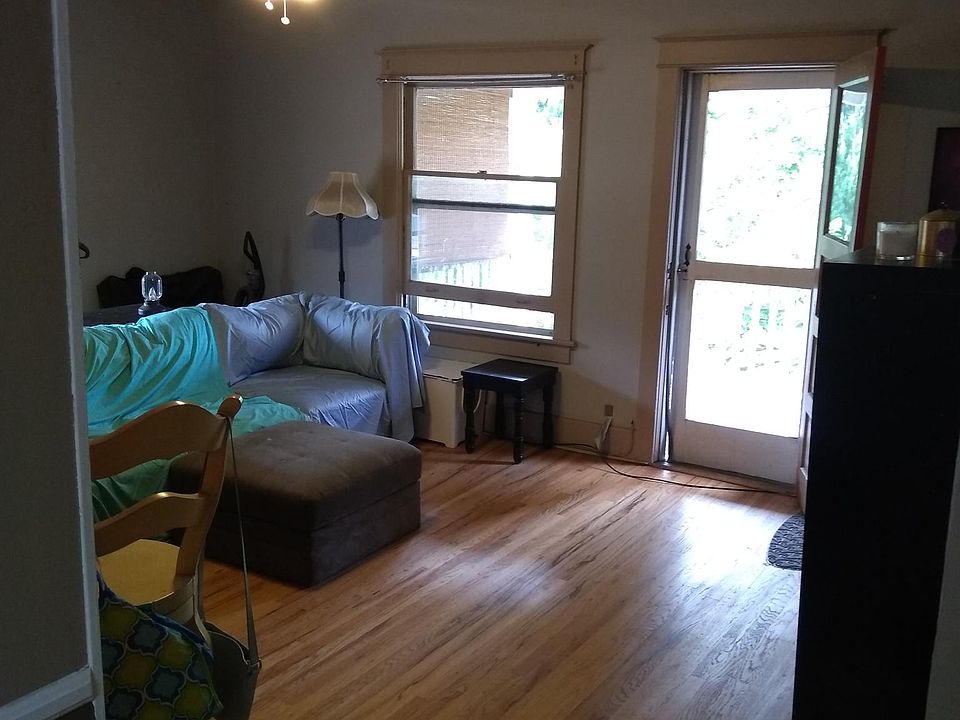 Living Room, Porch Door, Big Windows, Ceiling Fan, Hardwood Floors, High Ceilings
