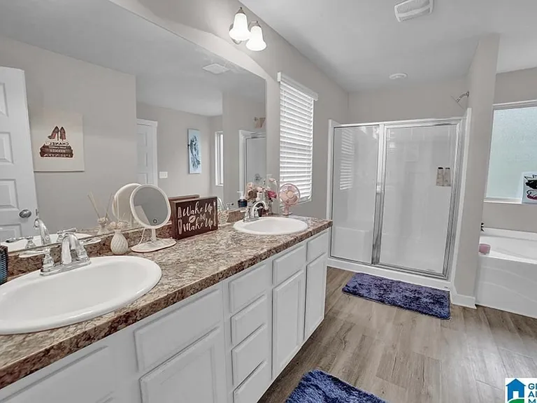 Master bathroom upstairs with walk in closet