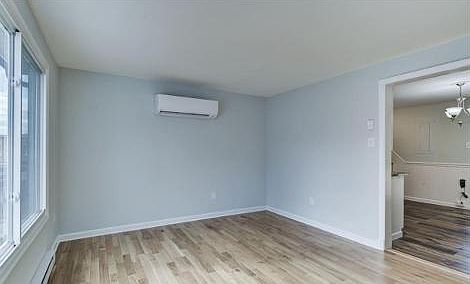 Open & light living area leading to spacious kitchen