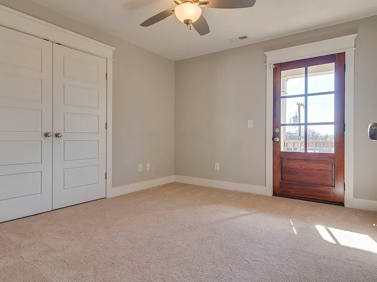 2nd bedroom with door to upstairs patio