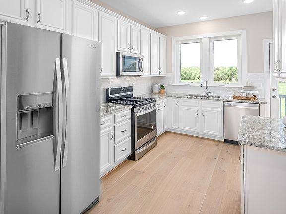 Model Representation - Stunning Kitchen with Granite Counters and KitchenAid Appliances