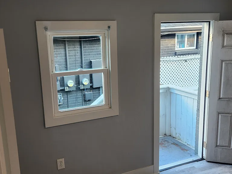 Back Bedroom (shows back door open)